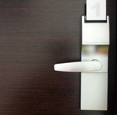 A fire alarm from Gamewell is mounted on a wall.